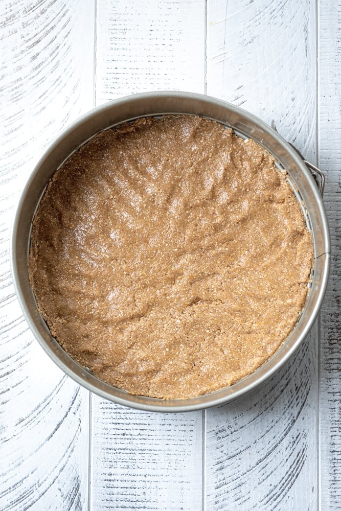 crust pushed out in an even layer along the bottom of the pan