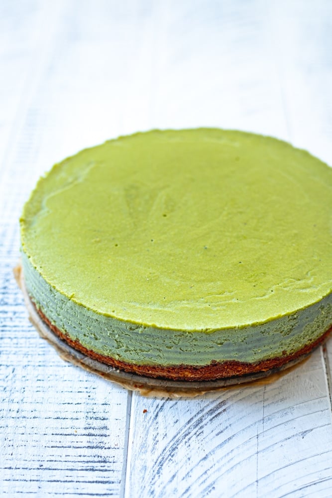 side profile of frozen matcha cheesecake