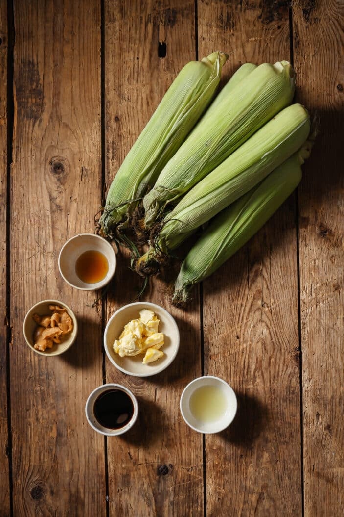 All of the ingredients required to make oven baked corn on the cob