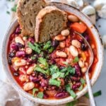 Vegan Chili is so easy to make, hearty, protein rich and wholesome! Enjoy with bread, or scooped onto rice