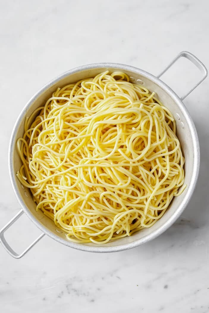 spaghetti noodles that have been cooked and strained