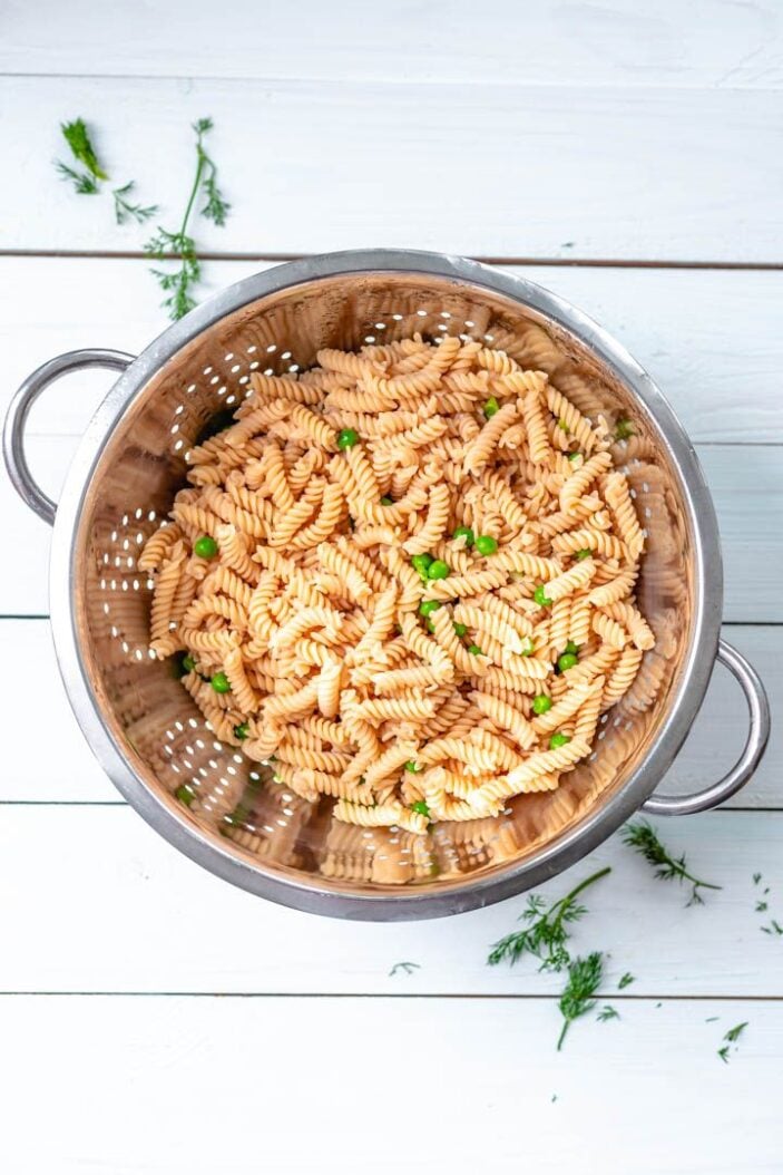 chickpea pasta in a saucepan that's been cooked and strained.