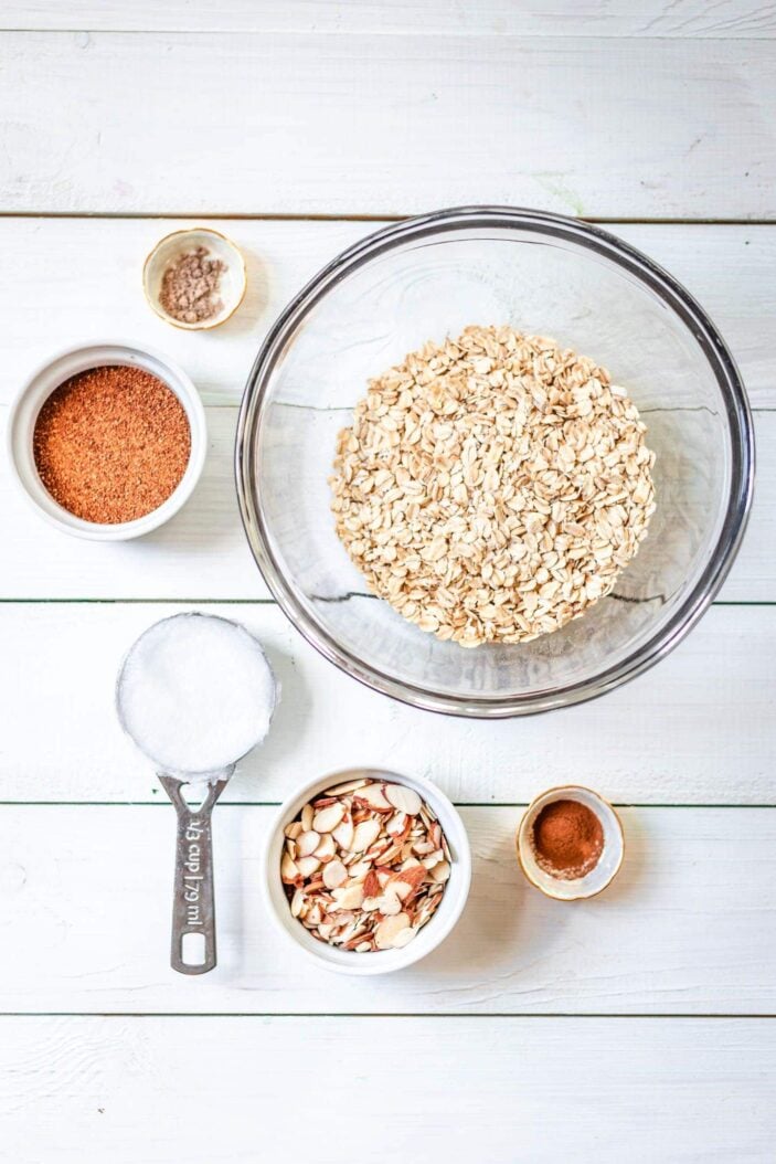 All the crumble topping ingredients separated into individual bowls.