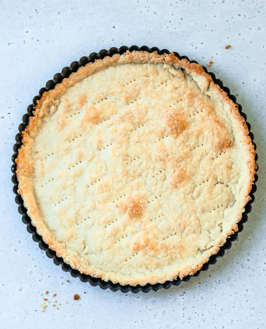 tart crust that has been blind baked until lightly golden