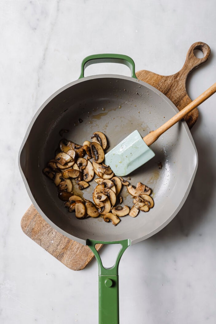 Cooked mushrooms in a skillet. 