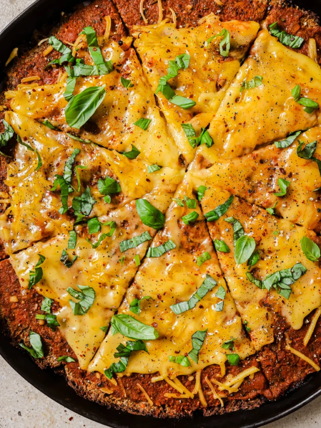 Dang that’s a Vegan Pizza with Cauliflower Crust.🙌 Comment “CAULIFLOWER” and I’ll DM the recipe. This is my cauli pizza crust recipe made with grated cauliflower and almond flour. Cooked until crispy golden, topped with marinara and vegan cheese. Enjoy it friends! 

#veganpizza #cauliflower #pizzarecipe #cauliflowerpizza #plantbasedrecipes